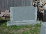 #121 - 4-0 Barre Gray Monument - Carved wild roses around sides and bottom